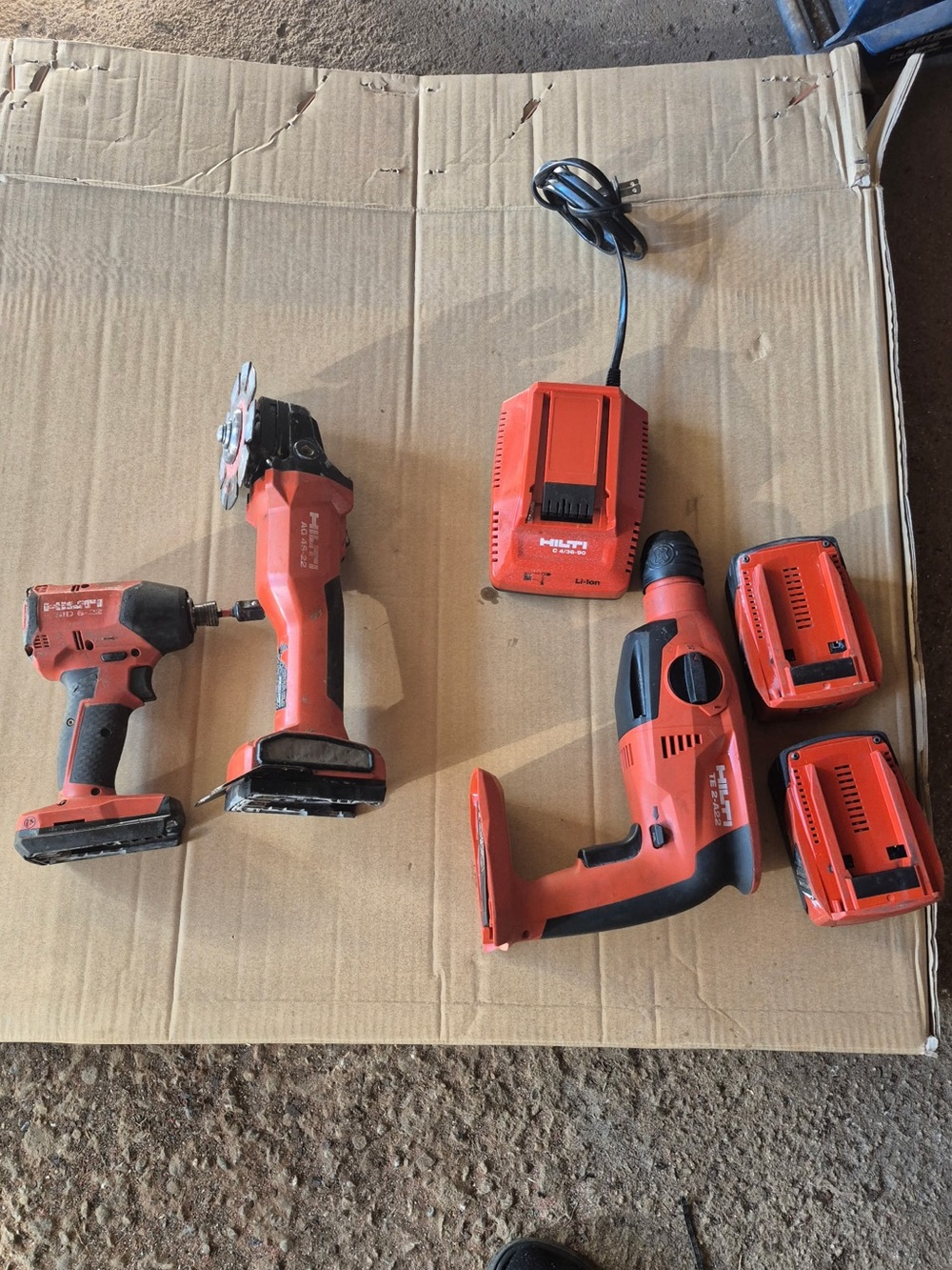 Cordless Power Tool Set in Red - Drill, Impact Driver, Grinder & Chargers